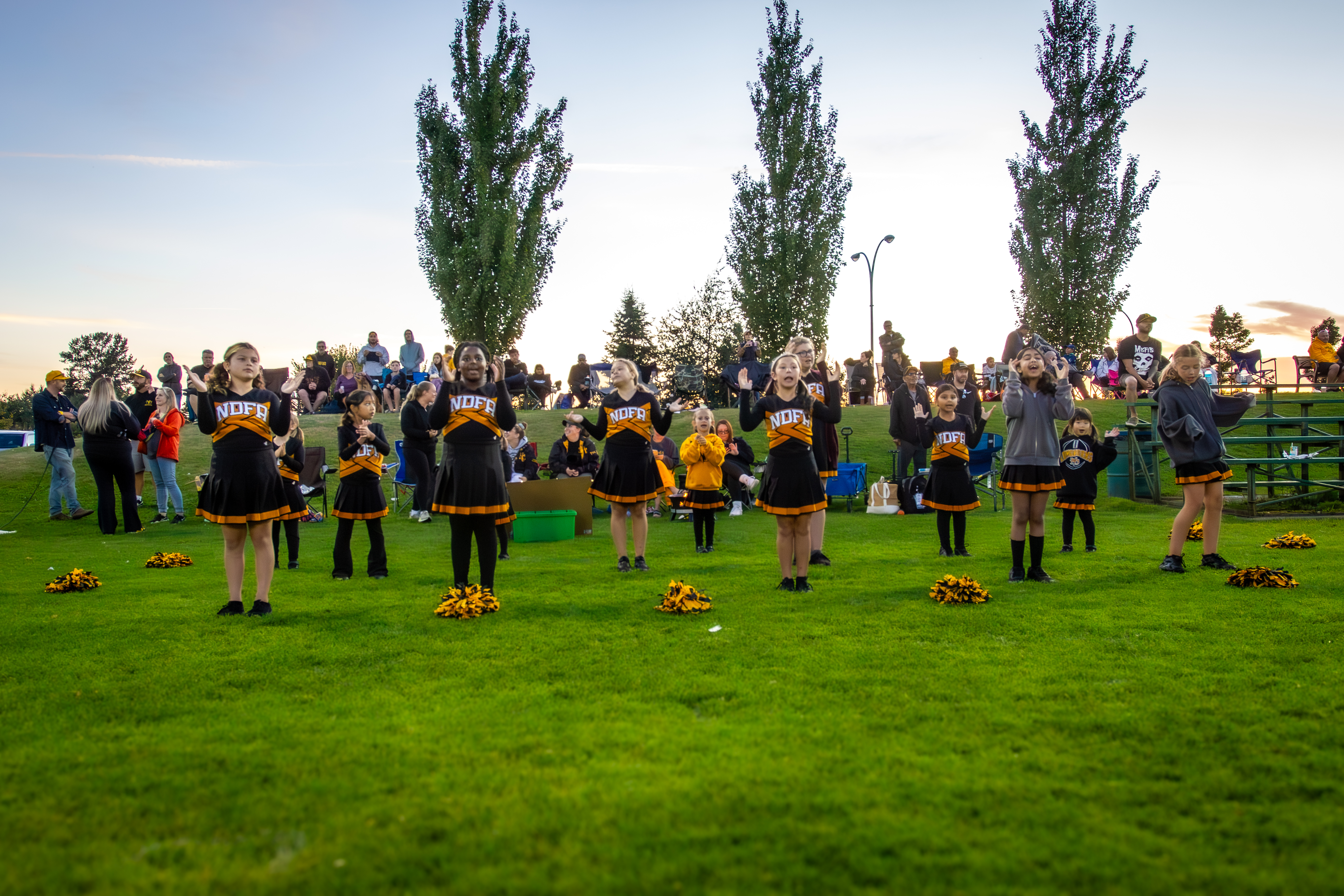 North Delta Longhorns cheerleaders performing at a game
